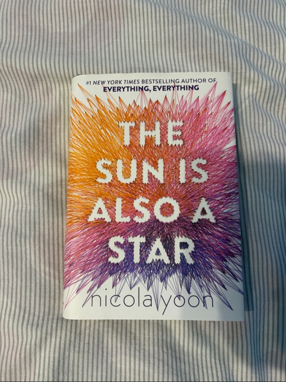 Nicola Yoon The Sun Is Also a Star — White, Orange, Pink, Purple Hardcover